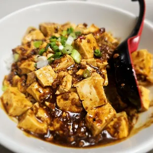 Dinner@Bo's Kitchen; 12/29/2024.Our long time Gf ordered Mapo Tofu* So nice of her she let me taste a lil of it, Cuz I thought it was Spicy?