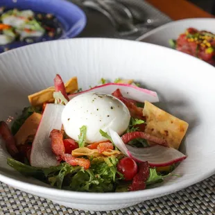 Frisée Salad with: soft boiled egg, lardons, warm
bacon vinaigrette