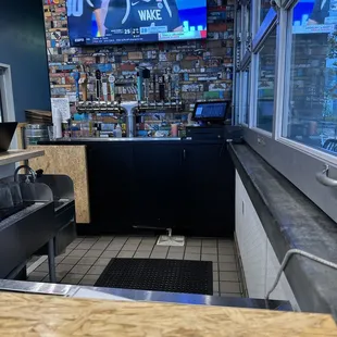 a bar with a television in the background