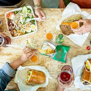 a table full of food and drinks