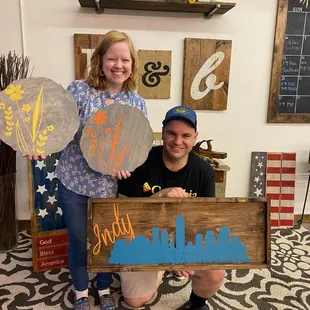 My husband and my project. He made an indianapolis skyline and I made a set of four chargers (only two are pictured here).