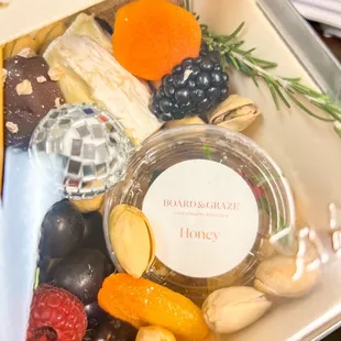 Personal size charcuterie &quot;board&quot; with New Years theme decor
