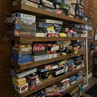 a shelf full of board games