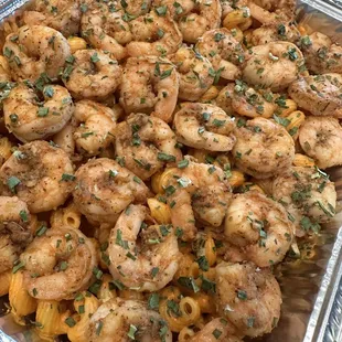 Roasted red pepper pasta with grilled shrimp 
Family style tray