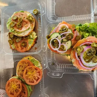 a variety of sandwiches in plastic containers
