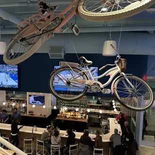 a bicycle suspended from the ceiling