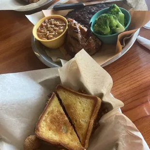 Son of a Brisket Sandwich, Ribs, BBQ Beer Can Chicken, Baked Beans , Broccoli and Hushpuppies!