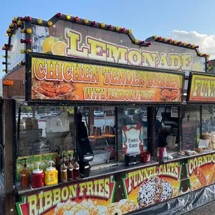 Located in the parking lot