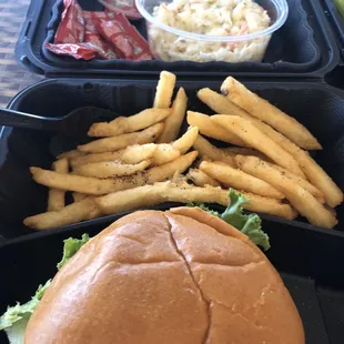 a sandwich and fries in a tray