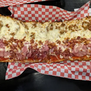 a large meat and cheese sandwich