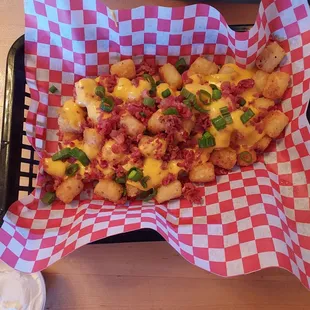 Loaded Irish nachos (tater tots) my friend had. (They said "loaded" means green onions, and regular is without the onions.)