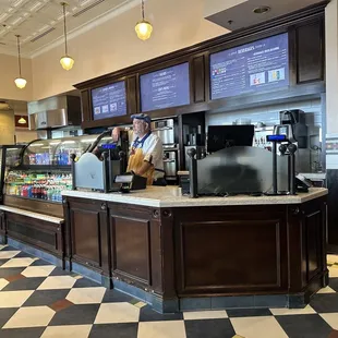 customers ordering food at the counter