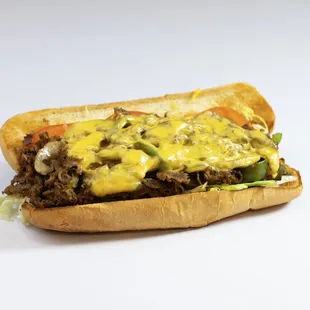 a beef sandwich with cheese and lettuce