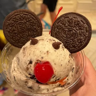 mickey mouse ears with a cherry on top