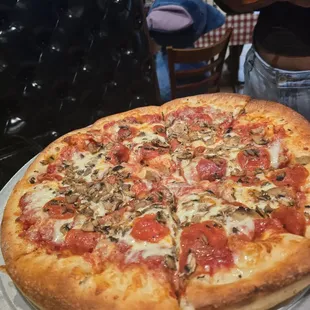 Deep dish pepperoni and mushrooms