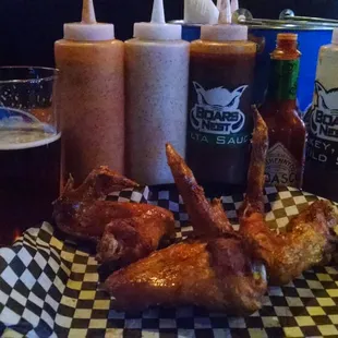 Hot wings with a variety of sauces and German beer