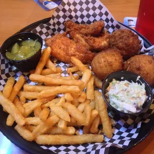Catfish pieces, hush puppies and fries. Fish tastes like buffalo wings and hush puppies were raw in middle. I don&apos;t recommend.
