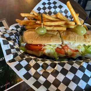 a sub sandwich and french fries