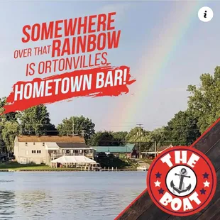 a rainbow over the water and a home town bar