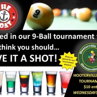 a pool ball and shot glasses