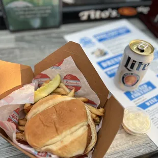 a burger and fries on a table