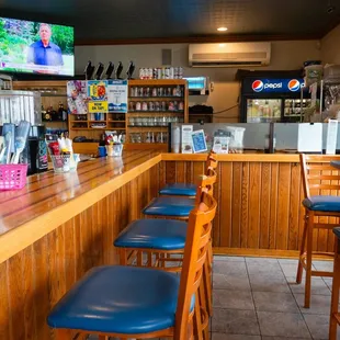bar with blue chairs
