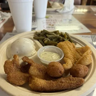 Catfish-Cajun and regular mixed with mashed potatoes and green beans.