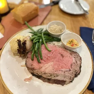a plate of meat and vegetables