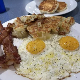 Bacon only $1 more and cup of gravy less than $3.