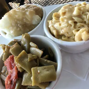 Mashed potatoes and gravy, Italian green beans and Mac &amp; cheese .