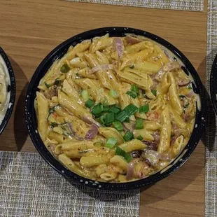 three bowls of pasta