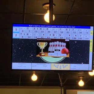 a bowling game on a big screen