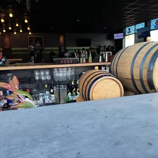 a bar with barrels