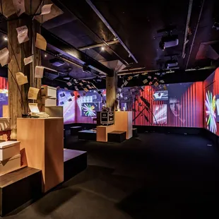 An immersive film experience initiates visitors through an innovative cascade of archival music and film