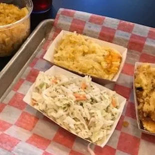 Mac and Cheese, cheesy potatoes, coleslaw, and corn casserole