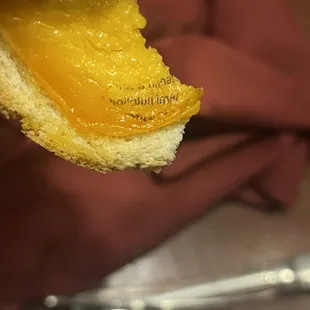 a piece of bread with a bite taken out of it