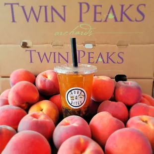 Seasonal peach green tea with brown sugar coated boba. We use sweet peaches from a local orchard