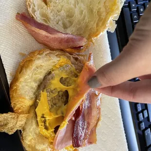 Supposed to be a ham, bacon, cheese and EGG croissant. Instead I received a bacon, ham, cheese and SAUSAGE, no EGG CROISSANT.