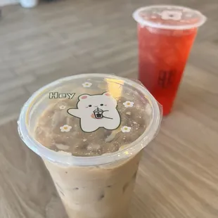 Hokkaido Milk Tea with honey boba and Strawberry Tea with popping boba