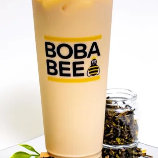 a glass of boba and tea