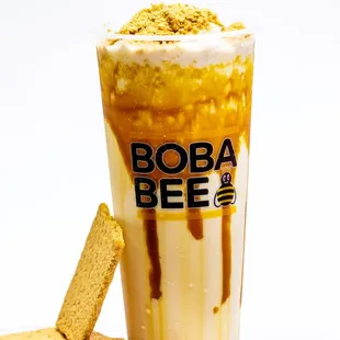 a glass of milkshake and crackers