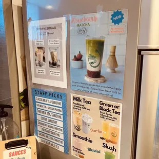 a fridge with a variety of drinks on it