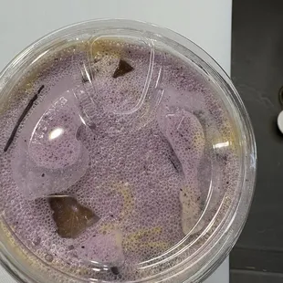 Iced blueberry latte with blueberry cold foam