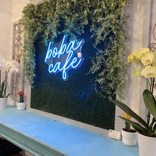 a neon sign on a wall