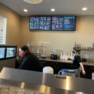 a woman sitting at the counter