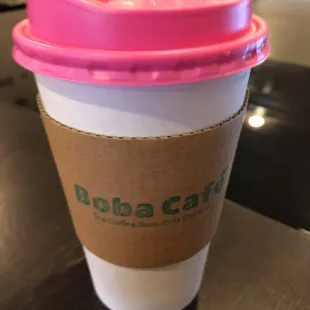 a cup of coffee on a table