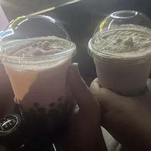 Strawberry smoothie and cookies and cream smoothie with extra boba