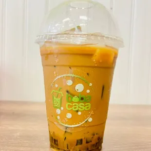 a plastic cup of iced coffee