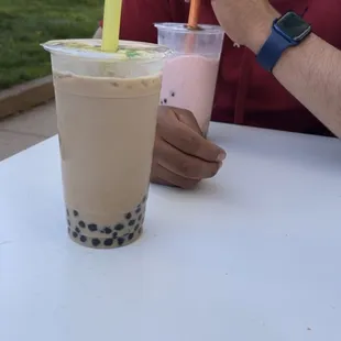 Soy milk tea at 25% sweet with boba  Strawberry banana smoothie at 75% sweet with boba