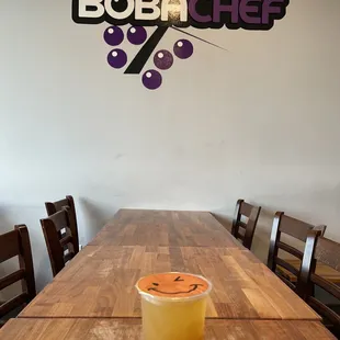 Passion fruit green tea with mango popping boba